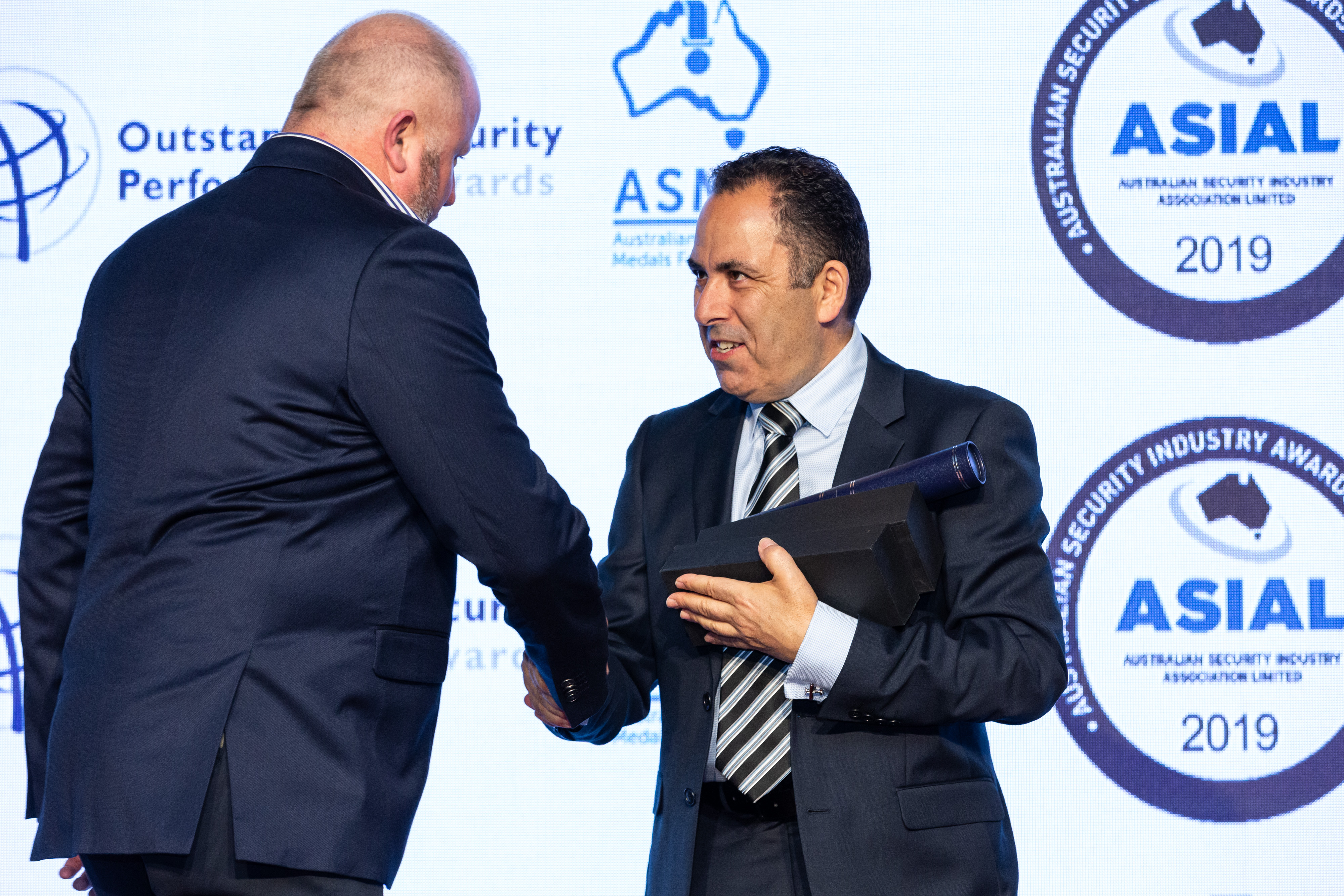 group celebrating 2019 security awards